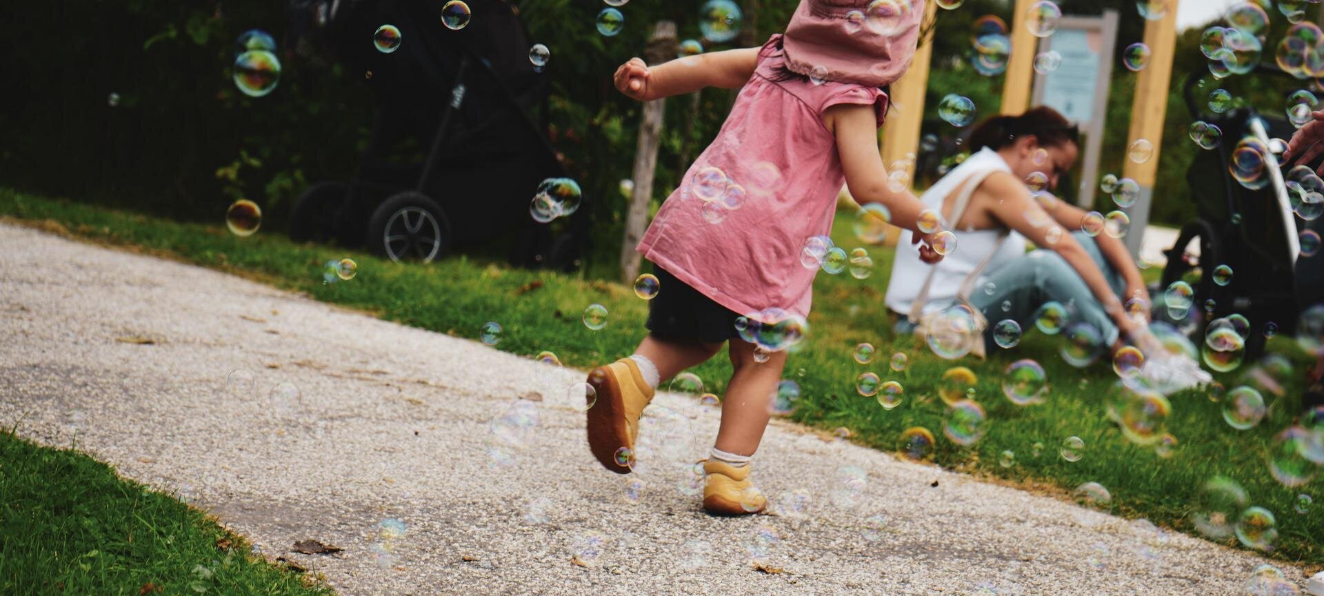 Kind mit Seifenblasen